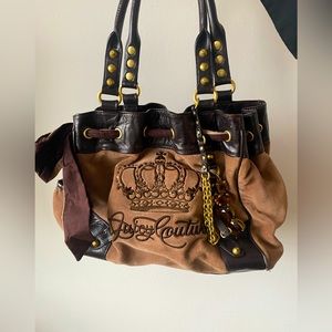 Sexy vintage juicy couture purse with gorgeous gold accents and charms!